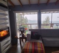 Amplio living con Bosca