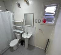 Baño con instalación de lavadora 