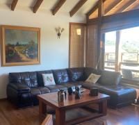 Living con vista al embalse