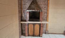 Parrilla con campana para extracción de humo 