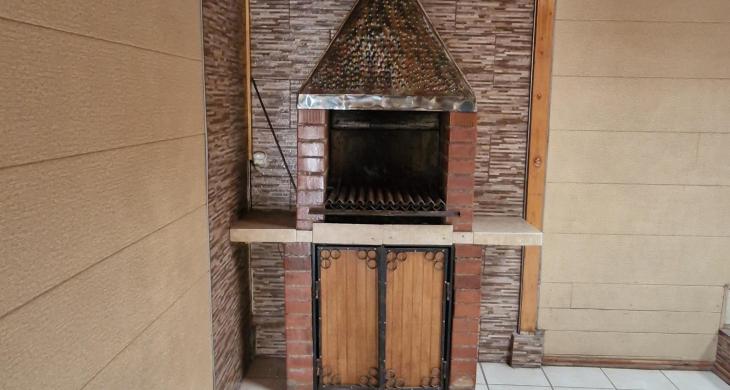 Parrilla con campana para extracción de humo 