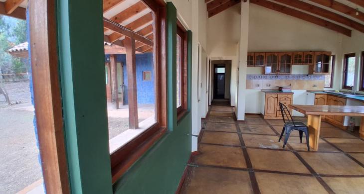 Sala de estar, comedor y cocina Ventanales 